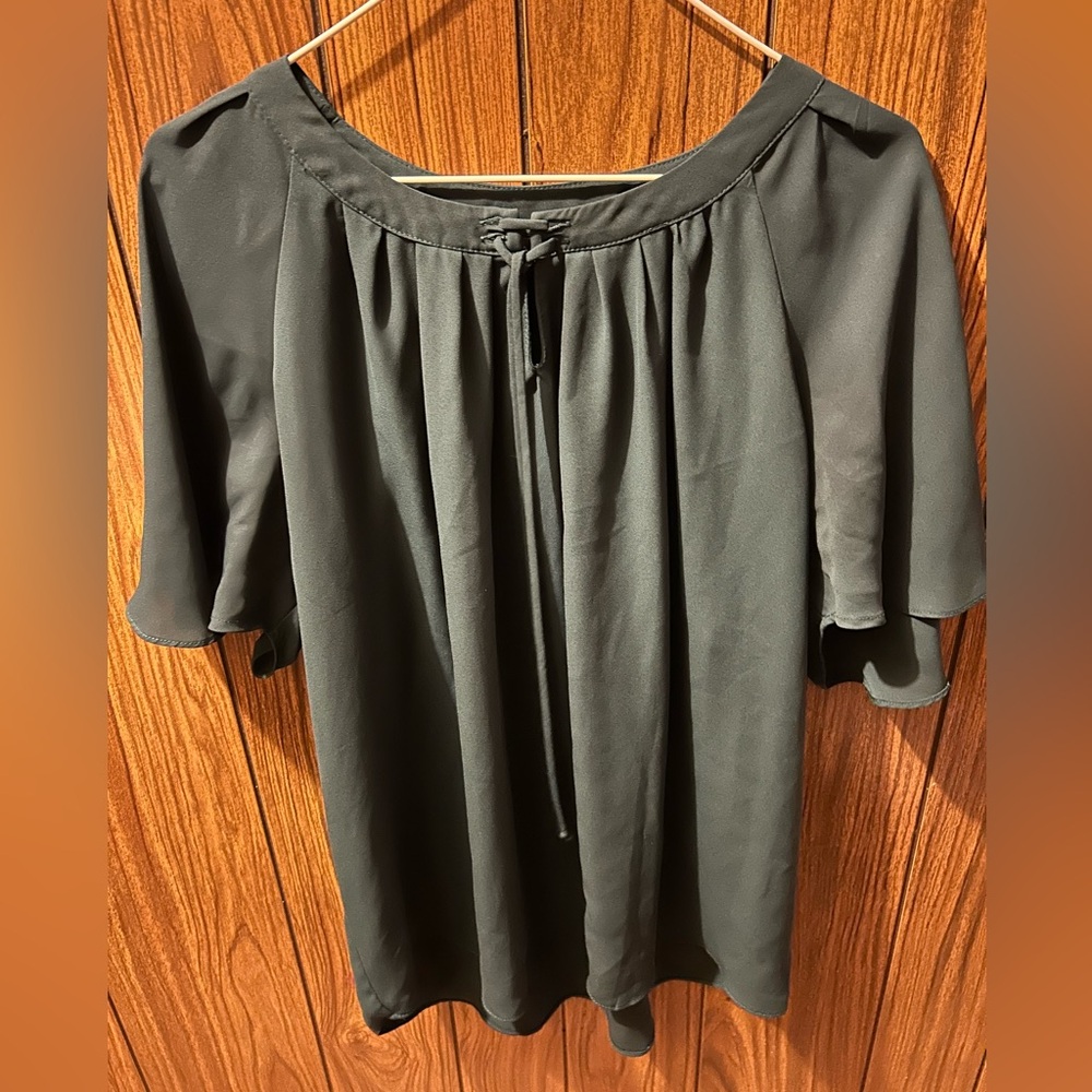 Green dressy short sleeve woman’s top